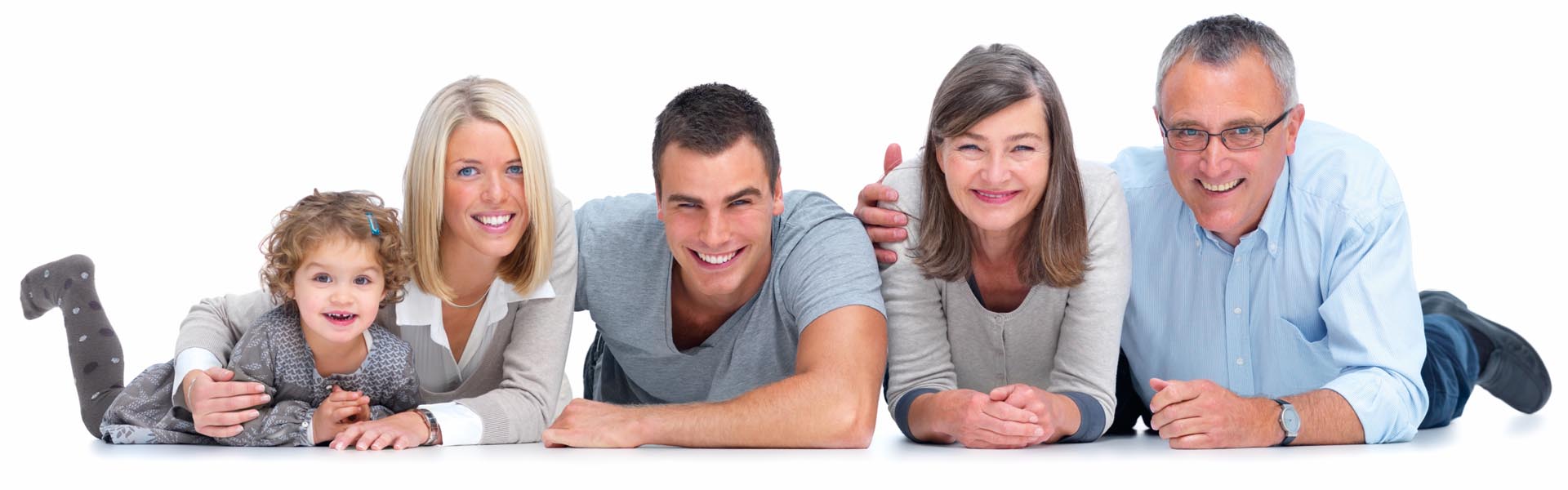 Happy family lying on the floor isolated on white